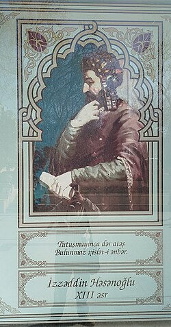 Nizami adına Ədəbiyyat Muzeyinin binasının pəncərəsində İzzəddin Həsənoğlu rəsmi.